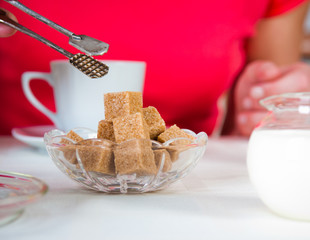 Brown sugar on a table at restaurant