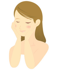 頬を両手で押さえて肌のしっとり感を感じる日本人女性