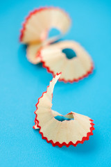 pencil shavings on blue macro