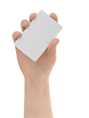 Female hand holding a blank paper