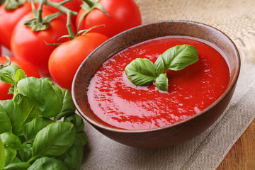 Traditional tomato soup with basil