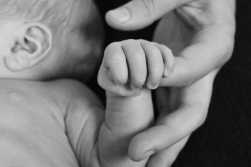 Father's and baby's hands