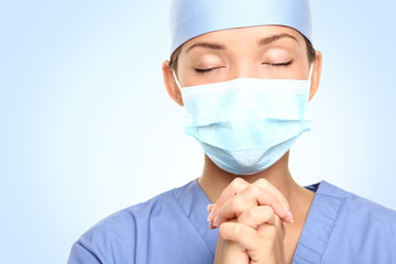medical doctor praying