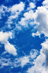 Naklejka na ściany i meble Background of blue sky with cumulus clouds