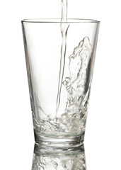 pouring water on glass