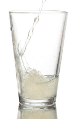 pouring refreshment on glass
