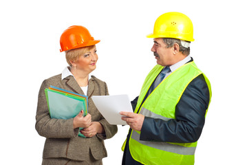 Smiling mature engineers having conversation