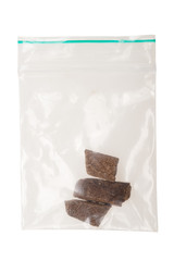 pieces of hashish in a plastic bag