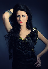 Beautiful woman with long black healthy hair in arabic tradition