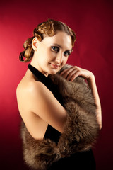 Shot of woman in classic style with fur
