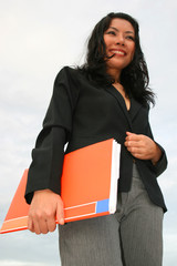 Obraz premium Asian business woman holding file.