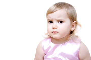 Serious little girl isolated on white background