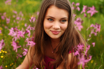 Fototapeta premium woman on pink flower field