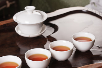 Obraz na płótnie Canvas Teapot, cups and tea
