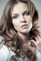 Fototapeta premium Closeup portrait of a sexy young woman with natural makeup