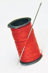 Spool of thread and needle