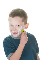 young boy shaving
