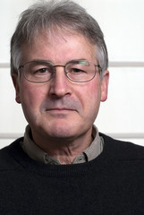 Obraz premium Bespectacled man in middle fifties wearing black sweater.