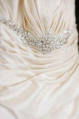Beautiful wedding dress decoration close up