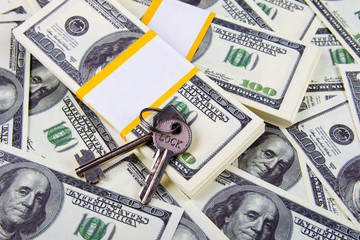 Keys of one hundred dollar bills background