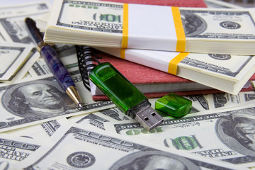 Dollars, notebook and pen, money background