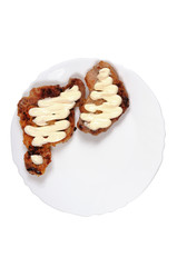 Grilled meat  with  mayonnaise  on a plate.