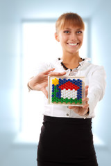 businesswoman holding concept house easy maked of mosaic