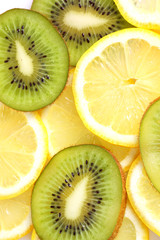 Fototapeta na wymiar Kiwi and lemon slices on white background