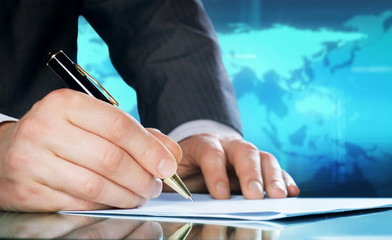 Businessman's hand with pen