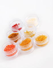 beads in jars, placer