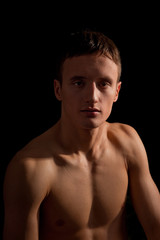 Fototapeta na wymiar young sportsman with a bare torso