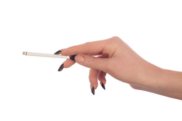 Female hand holds a cigarette