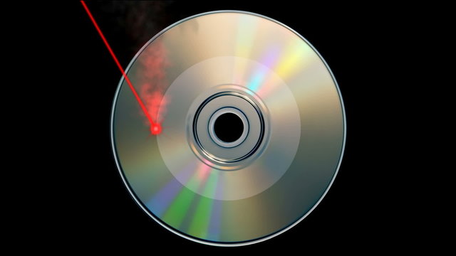 Rotating CD DVD burning animation with laser beam