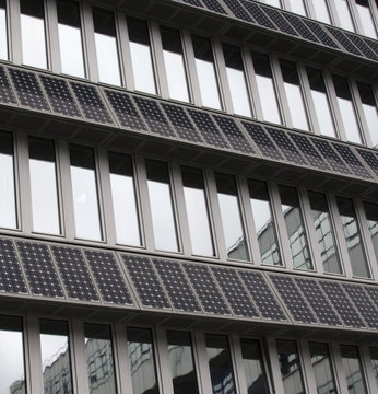 Solar Photovoltaic Panels Mounted On Building Facade