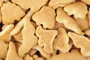 Abstract background:  dinosaur-shaped cookies