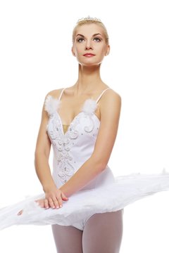 Beautiful ballet dancer isolated on white background