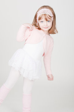 little smiling girl in ballerina costume