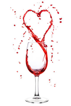 Wine splashing from wineglass in heart shape