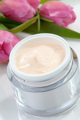 Face cream and tulips
