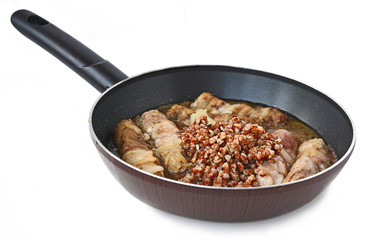 Frying Pan with buckwheat porridge and cannelons