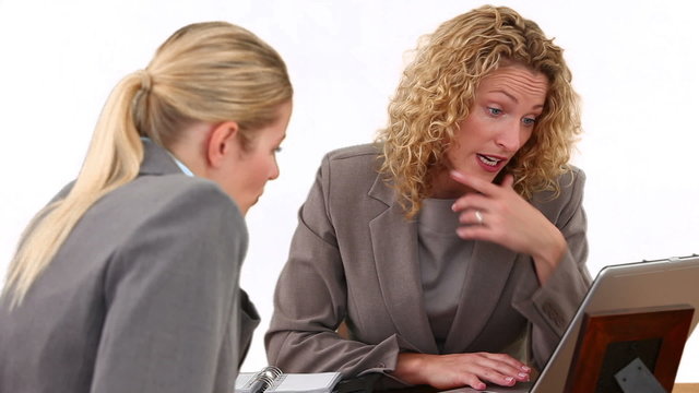 Businesswomen during a meeting having a problem