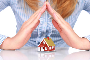 Hands and house.