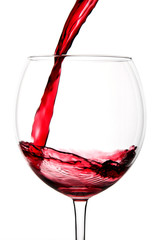 Red wine poured in a glass