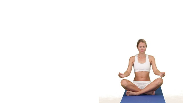 Woman in sportswear doing yoga