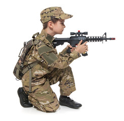 Fototapeta premium Young soldier with rifle