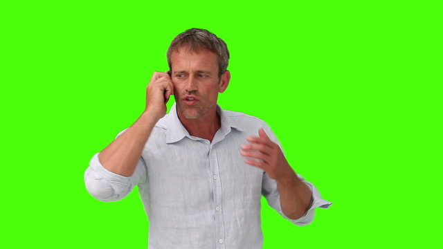 Man being nervous because of a phone call