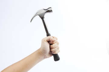 A hammer, A firm hand holding steel hammer.