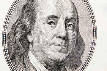 close-up of one hundred bill Franklin portrait