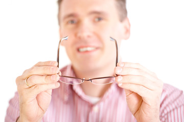 Optician presenting glasses