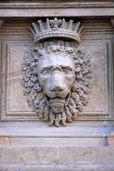 Italy, Florence Pitti Palace facade lion details.
